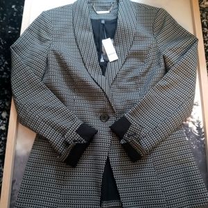 Edgy black and white blazer